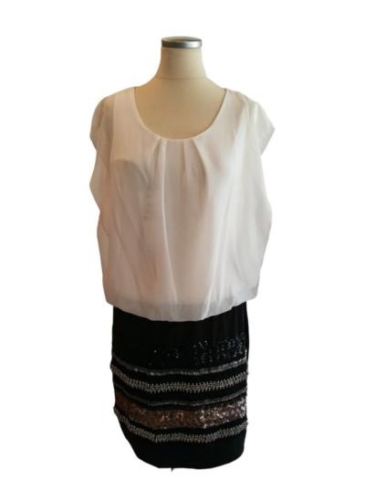 White Top on Black Short Skirt